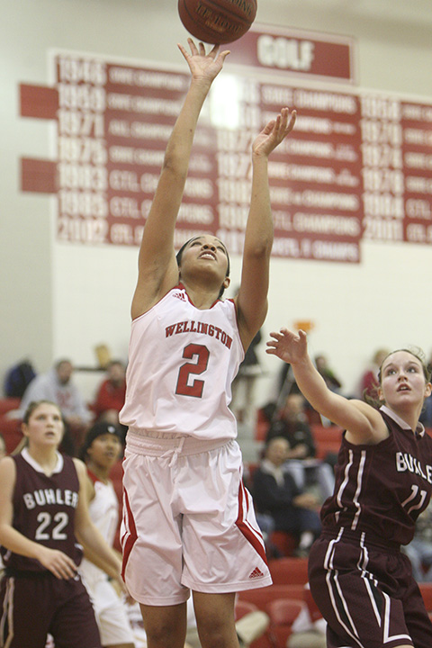 Tayland French goes to the hoop against Buhler. (Dustin Craig photo).