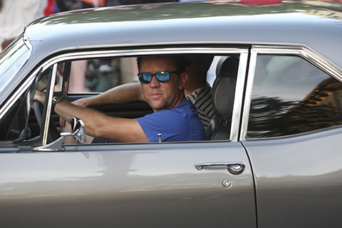 Jason Meslin last week in the Kansas Wheat Festival parade driving a Chevrolet Nova in tribute to a lost friend.