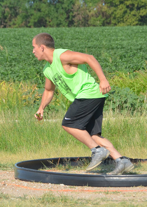Bryan Dennett represents the Enchies picks up the spike ready to bike.
